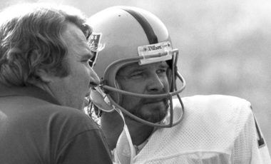 Oakland Raiders quarterback Ken Stabler (12) talks with Hall of Fame head coach John Madden during the Raiders 20-14 loss to the Los Angeles Rams on December 4, 1977 at the Los Angeles Memorial Coliseum in Los Angeles, California.  (AP Photo/NFL Photos)